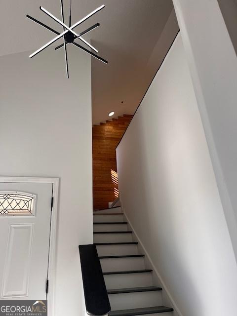 2254 Wellington Cir, Lithonia, GA 30058 - stairs featuring recessed lighting