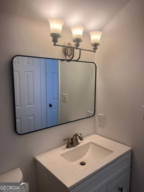 2254 Wellington Cir, Lithonia, GA 30058 - half bath with vanity and toilet