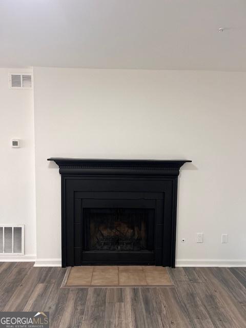 interior details with hardwood / wood-style floors