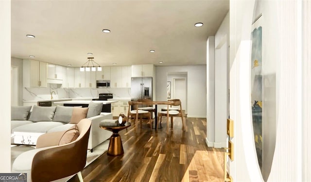 living room with sink and hardwood / wood-style flooring