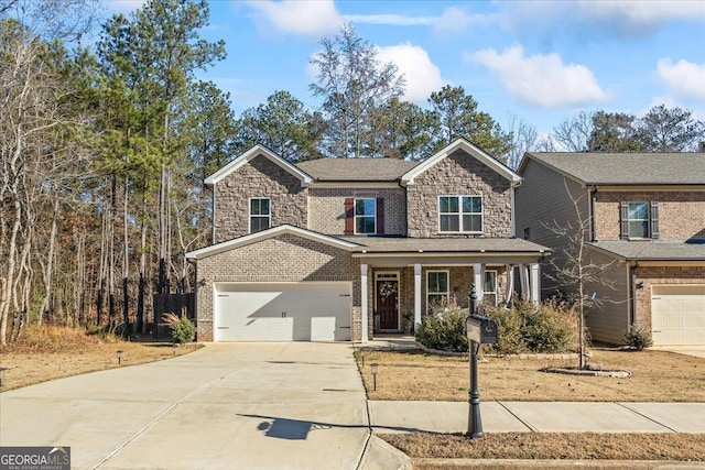 front of property with a garage