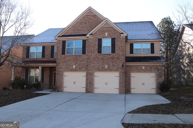 view of front of house with a garage