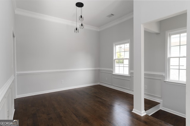 unfurnished dining area featuring crown molding and dark hardwood / wood-style floors