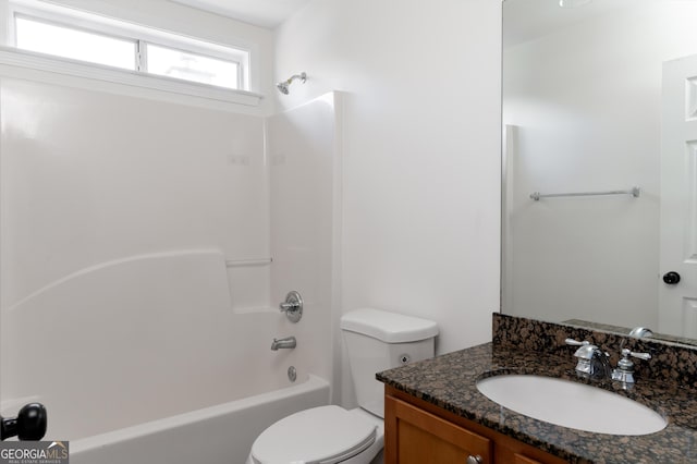 full bathroom featuring vanity, shower / bathtub combination, and toilet