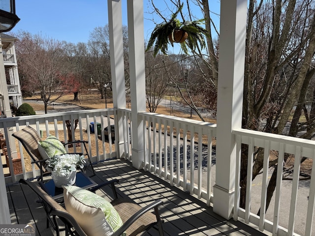 wooden terrace with covered porch