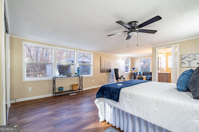 bedroom featuring multiple windows, dark wood-type flooring, and a textured ceiling