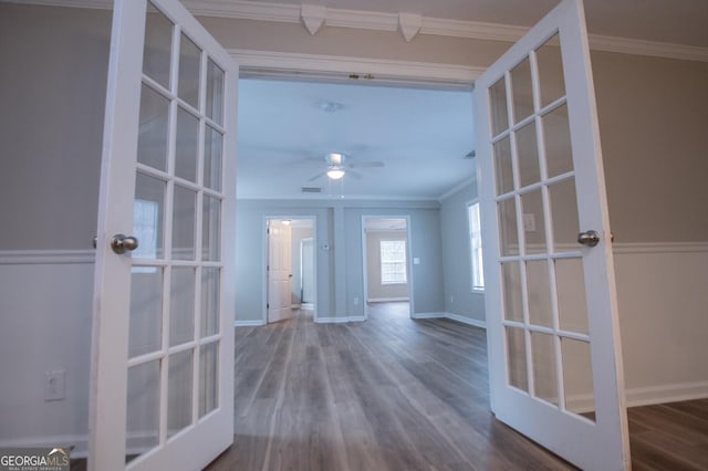 interior space featuring french doors, ceiling fan, ornamental molding, and hardwood / wood-style floors