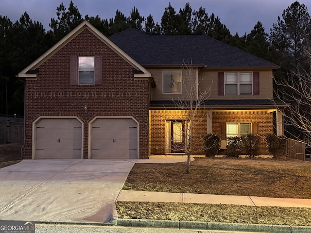 view of front property with a garage