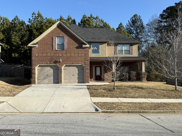 view of front of property with a garage