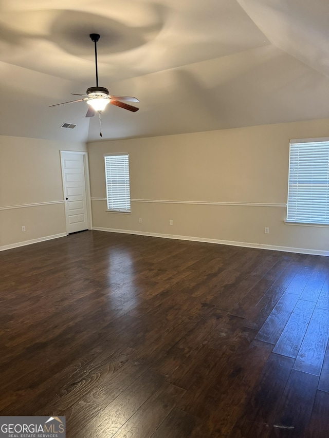 bonus room featuring ceiling fan and dark hardwood / wood-style floors