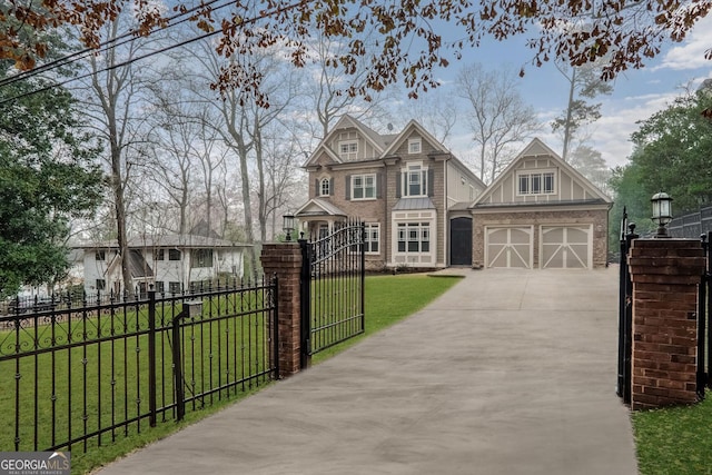 view of front of property featuring a garage and a front lawn