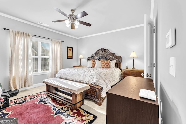 bedroom with light carpet, baseboards, visible vents, ceiling fan, and crown molding