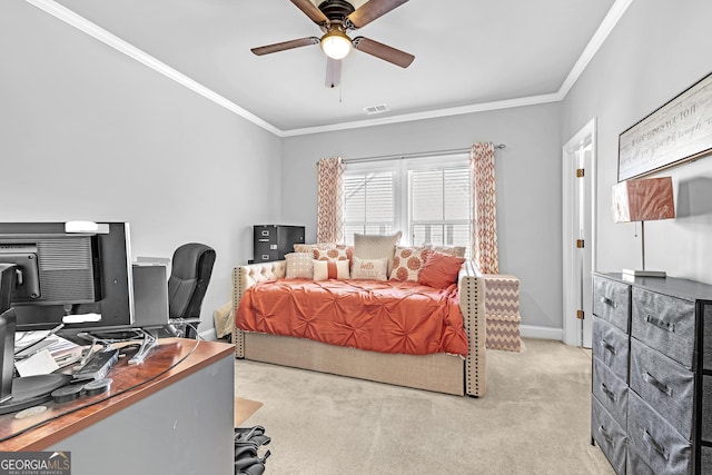 bedroom featuring baseboards, ornamental molding, visible vents, and light colored carpet