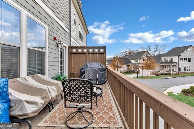 balcony featuring a residential view