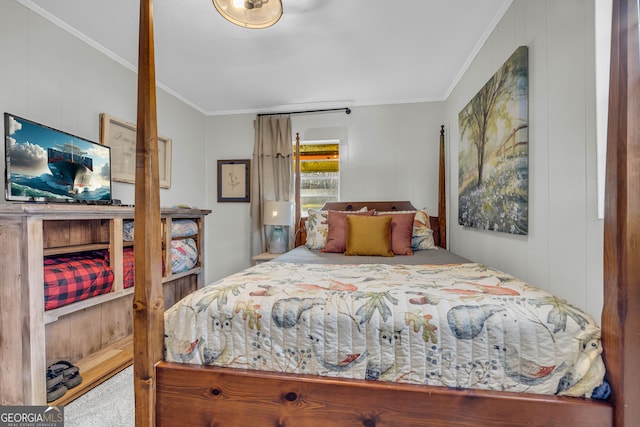 bedroom featuring ornamental molding, carpet floors, and wooden walls