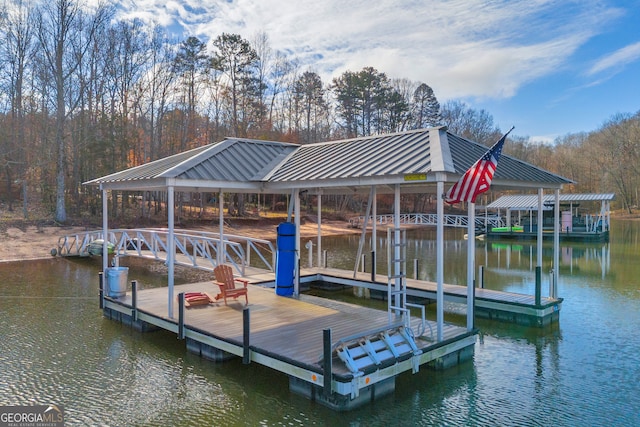 view of dock with a water view