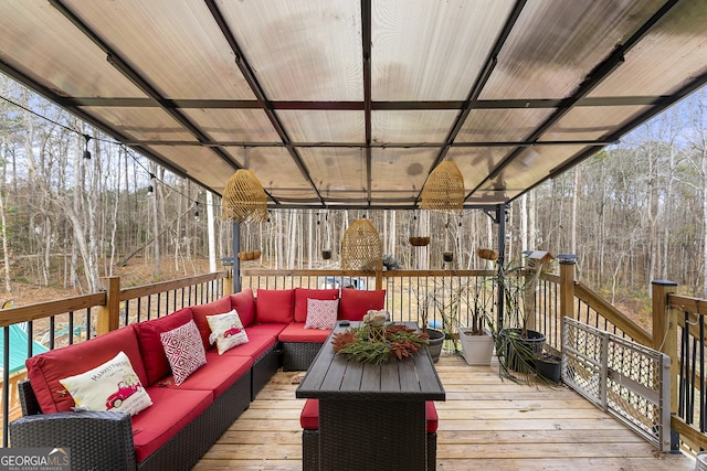 deck with an outdoor hangout area