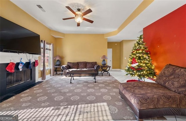 living room featuring ceiling fan