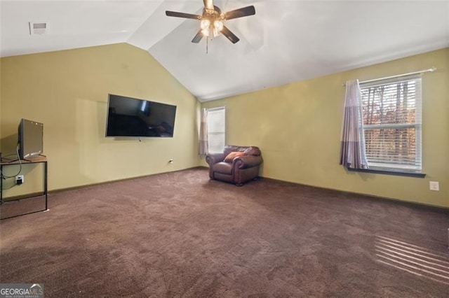 unfurnished room with carpet floors, vaulted ceiling, and ceiling fan