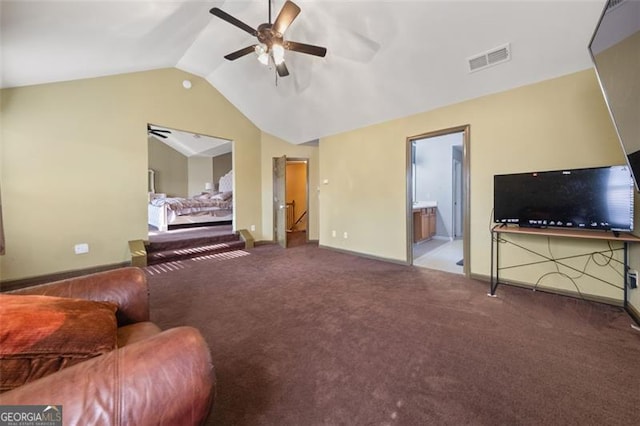 carpeted living room featuring vaulted ceiling and ceiling fan