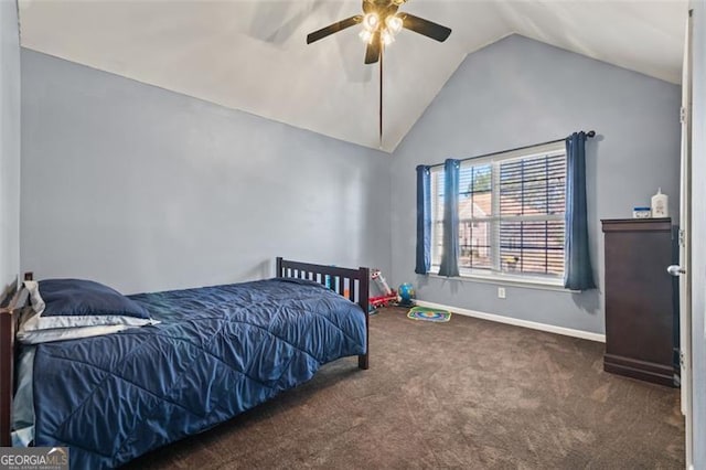 carpeted bedroom featuring vaulted ceiling and ceiling fan