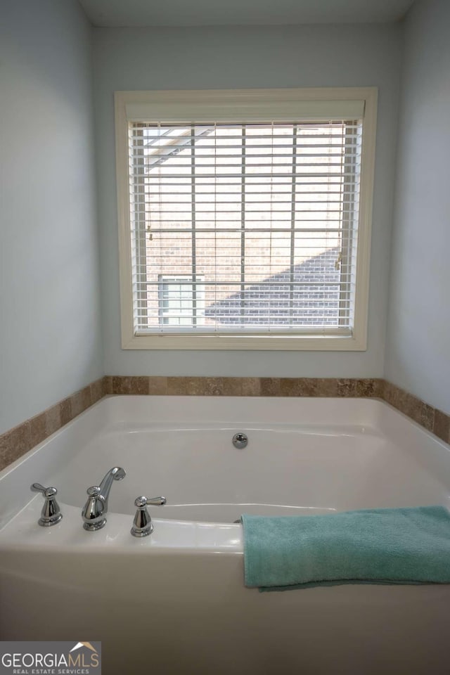 bathroom featuring plenty of natural light