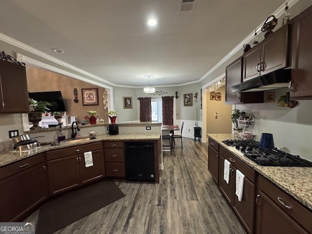 kitchen with sink, dark hardwood / wood-style flooring, kitchen peninsula, black appliances, and ornamental molding