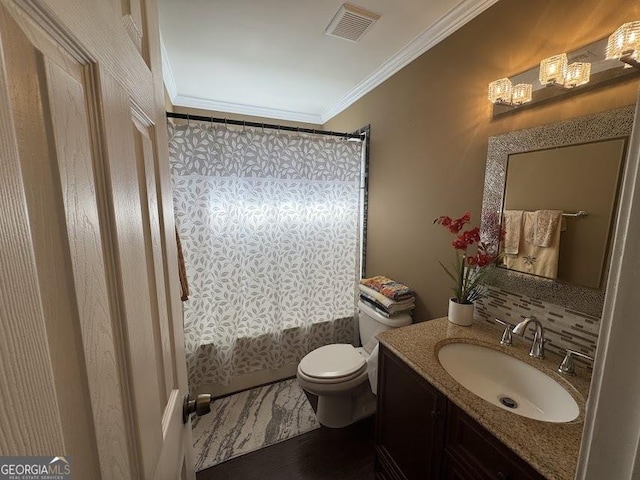 full bathroom featuring vanity, crown molding, toilet, shower / bath combo with shower curtain, and wood-type flooring