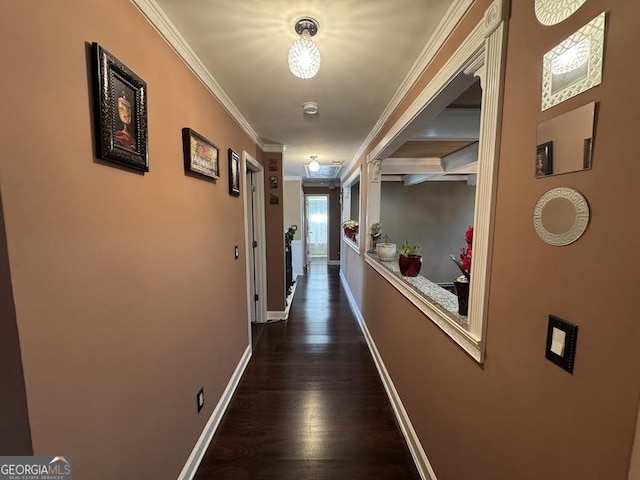 corridor with crown molding and dark wood-type flooring