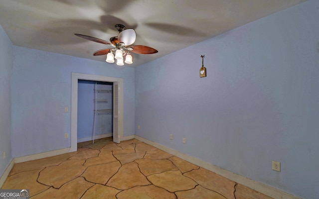 unfurnished bedroom featuring a closet and ceiling fan