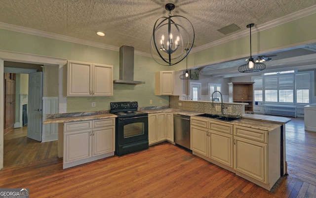 kitchen with pendant lighting, wall chimney range hood, light wood-type flooring, black / electric stove, and kitchen peninsula