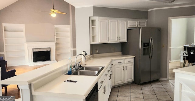 kitchen featuring ceiling fan, sink, light tile patterned floors, stainless steel fridge with ice dispenser, and white cabinets