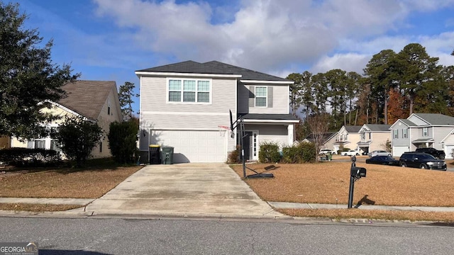 front of property featuring a garage