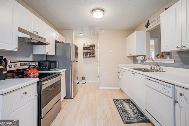 kitchen with white cabinets, electric range, sink, and white dishwasher