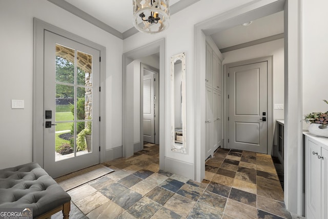 doorway featuring a chandelier