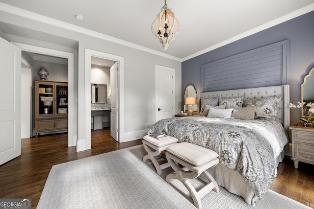 bedroom with ensuite bath, crown molding, a chandelier, and dark hardwood / wood-style floors