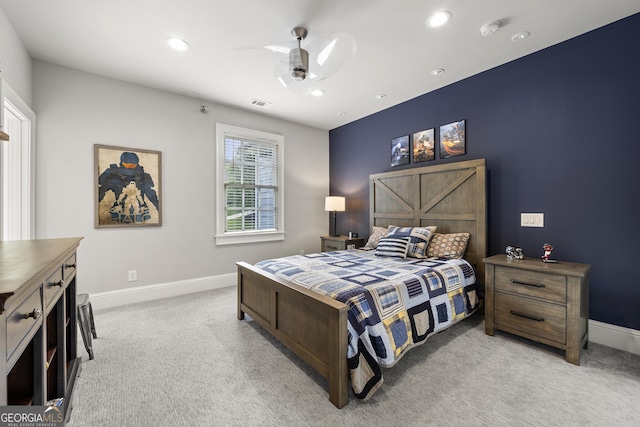 carpeted bedroom featuring ceiling fan