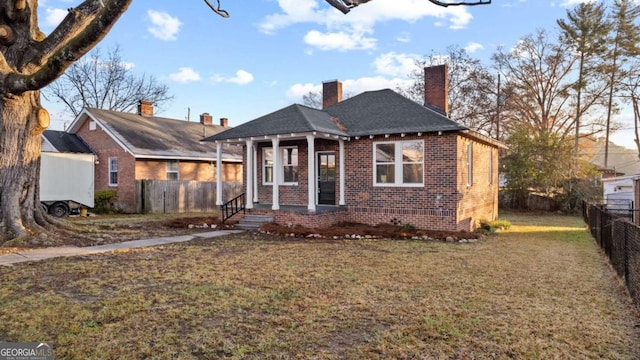 bungalow with a front lawn