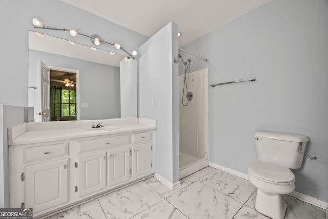 full bathroom featuring toilet, a shower stall, marble finish floor, and baseboards