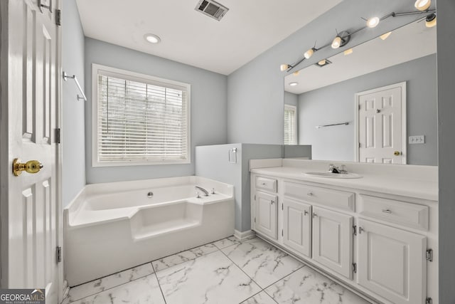 full bathroom featuring visible vents, recessed lighting, a bath, vanity, and marble finish floor