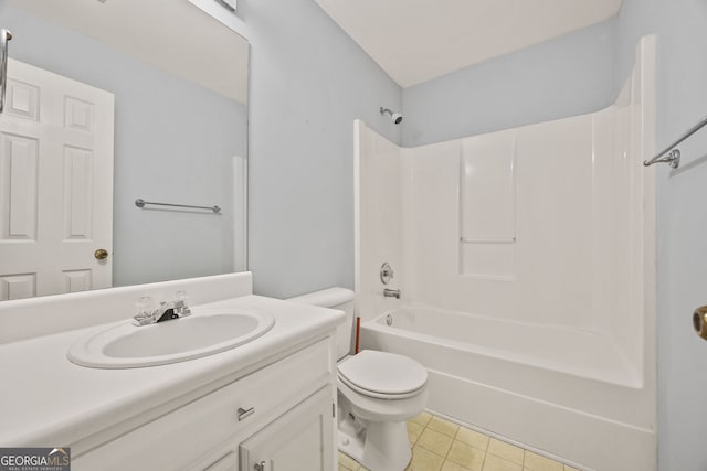 bathroom featuring toilet, tub / shower combination, and vanity