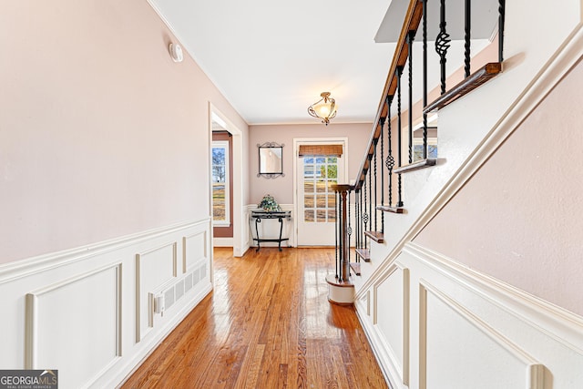 foyer entrance featuring light wood-type flooring