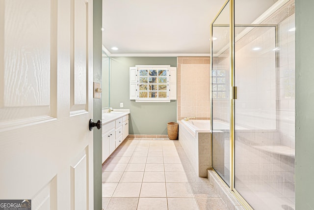 bathroom featuring tile patterned floors, vanity, and independent shower and bath