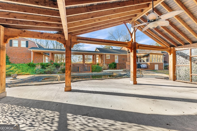 view of patio featuring ceiling fan