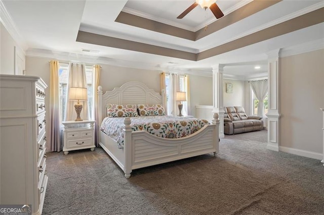 bedroom with ornate columns, ceiling fan, crown molding, and dark colored carpet