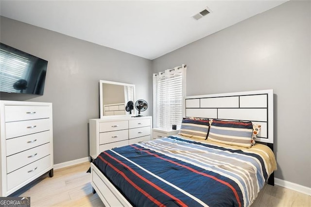 bedroom featuring light wood-type flooring