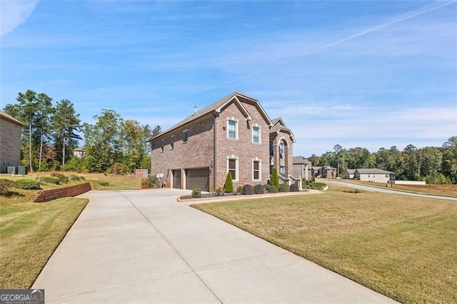 front of property featuring a garage and a front lawn