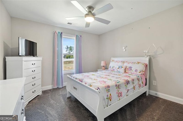 bedroom with dark carpet and ceiling fan