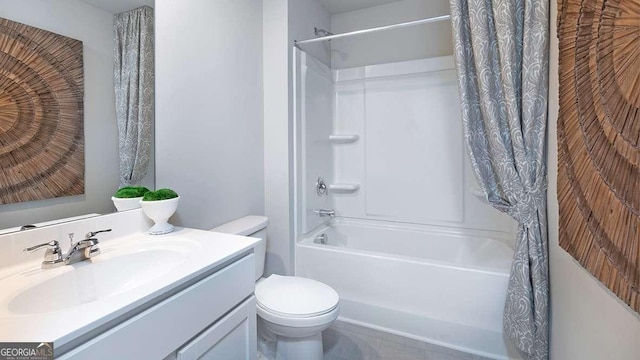 full bathroom featuring tile patterned flooring, shower / tub combo with curtain, vanity, and toilet