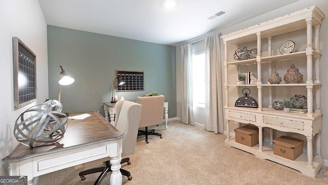 office area with light colored carpet